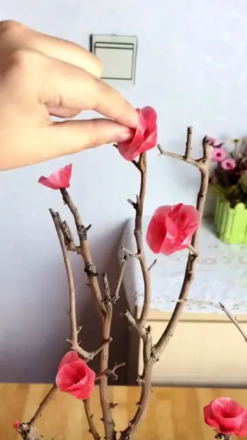 These flowers begin as wax, shaped petal by petal using fingers and cold water. 