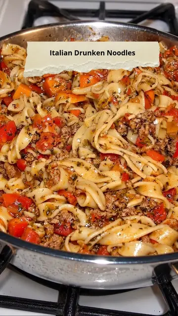 Italian Drunken Noodles 😍 Tossed with tender egg noodles, savory Italian sausag
