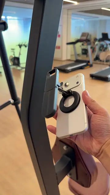 A pocket-size phone stand for filming solo. Magnetic mounting, a mini tripod, an