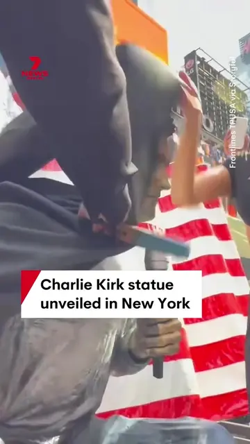 A life-size statue of Charlie Kirk has been unveiled in Times Square, New York t