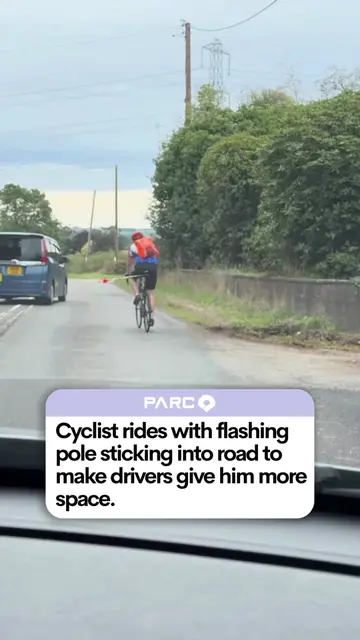 This is definitely a new one 😂 This cyclist was spotted riding with a pole stic
