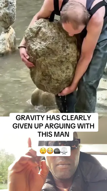 Some talents are born not made.  A man balancing large rocks in a stream using p
