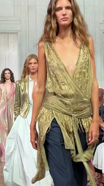 A silk-satin crossover top, embellished with cascading tonal beadwork.   #RalphL