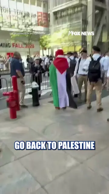 A firefighter unloads on pro-Palestinian agitators protesting near the 9/11 Memo
