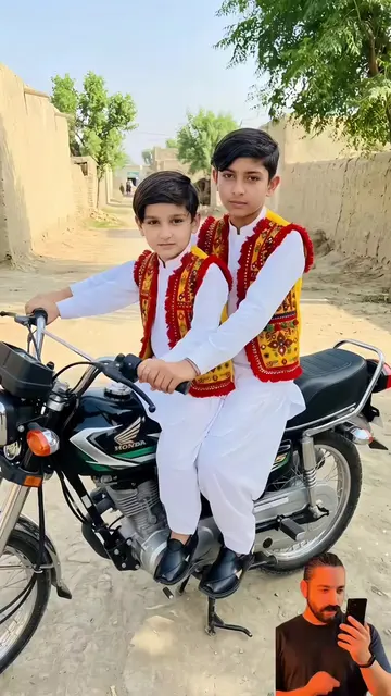 Create man shot with ethnic vest on motorcycle 1. سنگل مرد موٹرسائیکل پورٹریٹ ای