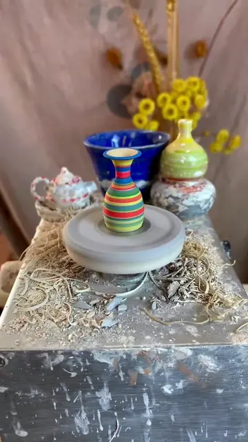 Xiao Jiang Pottery is a Chinese ceramic artist known for creating miniature vess