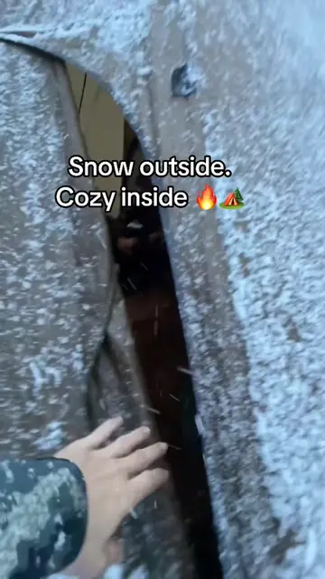Opening the tent door after spending time in the cold and seeing the warm glow o