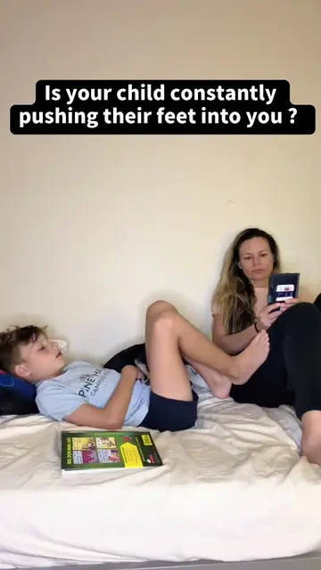 If your child is constantly pushing their feet into you, their body may be looki