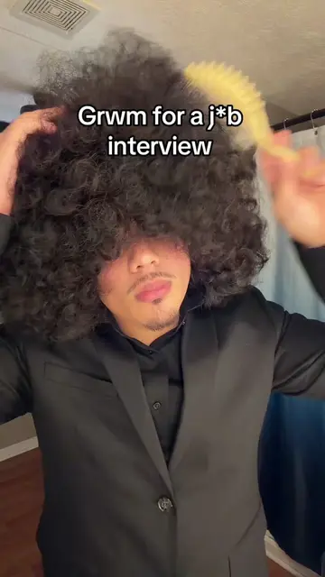 My first time ever wearing a suit. It looks cool with the big hair. #curlyhead #