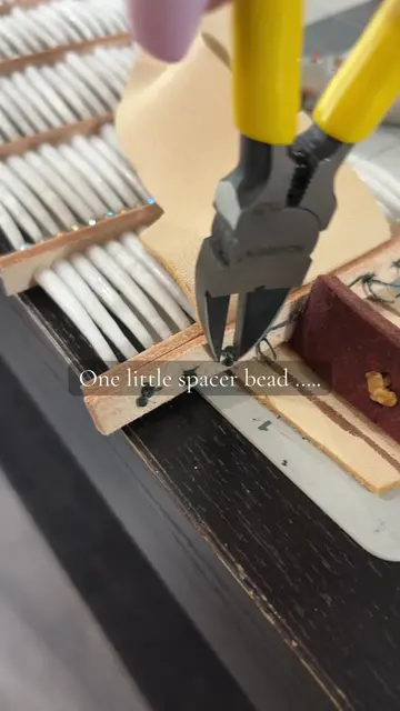 The tiniest detail can make all the difference. 🤎  #Dentalium #BehindtheBeadwor