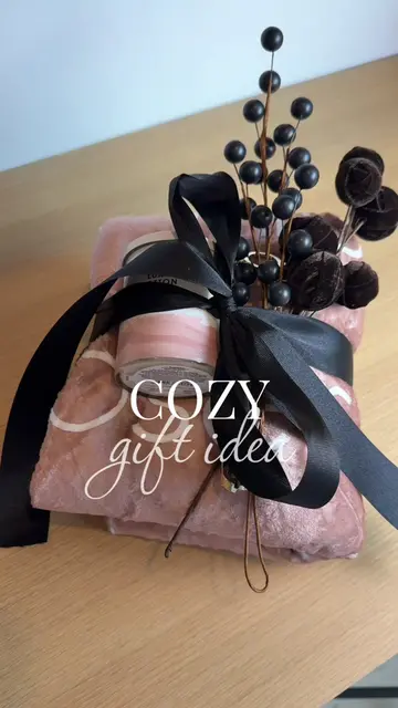 A personalized blanket + a few of their favorite things = the easiest cozy gift 