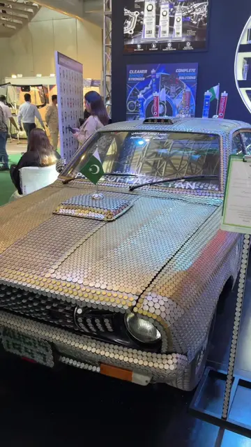 A Datsun full of coins at PAPS 2026. A unique classic car display with a surpris