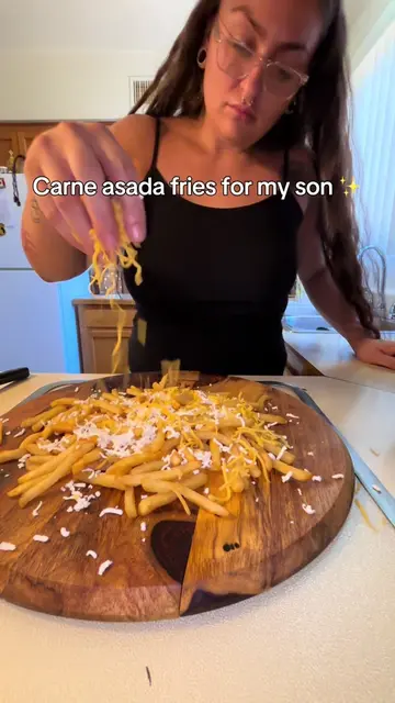 Carne asada fries for my son tonight ✨ Crispy fries, shredded cheese, carne asad
