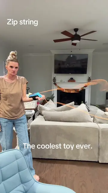 The coolest toy I have seen. This is called zip string.  Zip String Launcher. @Z