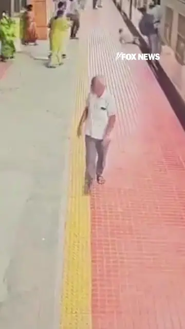 WATCH: A station guard races to save a 69-year-old passenger being dragged along