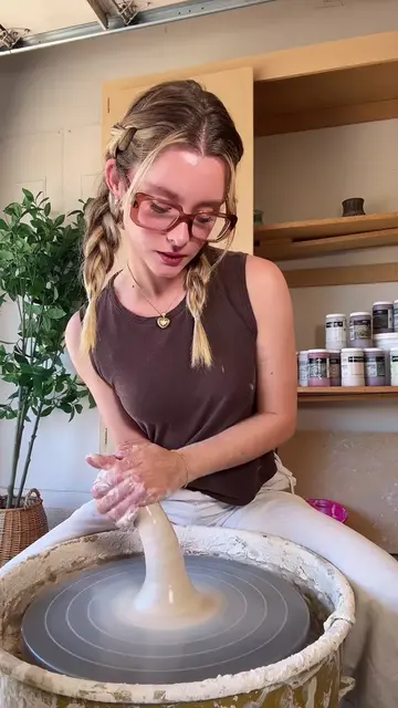 Making mugs in the pottery studio 