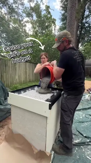 DIY concrete countertops took this outdoor kitchen to another level. Mixing, pou