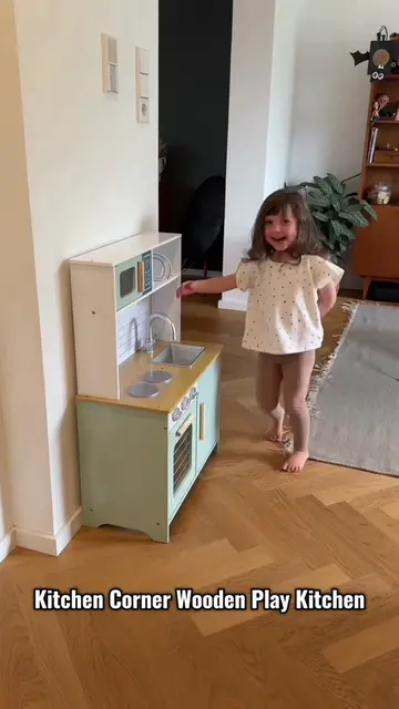 Discover the joy of playtime cooking with this Kitchen Corner Wooden Play Kitche