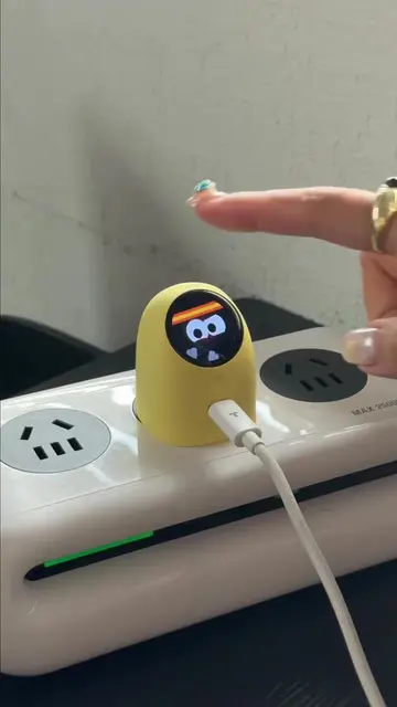 My cutest charging companion💛💛#iPhone #techtok #cutetech #charger #desksetup 