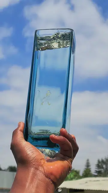 The best way to cut a Whiskey blue bottle to make a beautiful flower vase using 