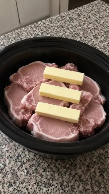 These slow cooker pork chops are so tender you don't even need a knife! Just 4
 