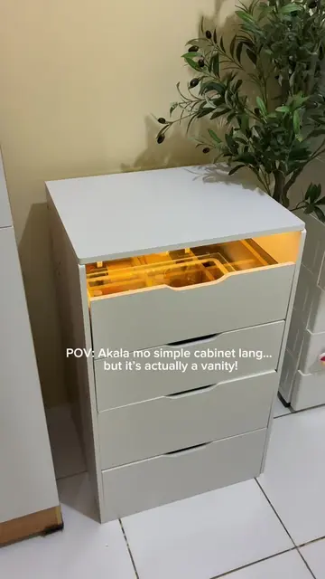 Looks like a simple cabinet, but it’s actually a vanity + storage + working tabl