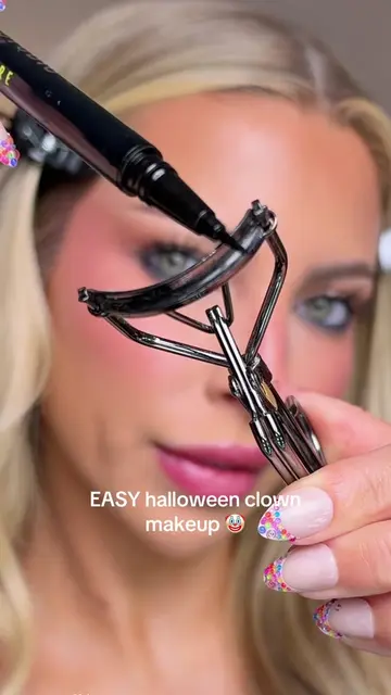 EASY clown makeup 🤡  All you need is an eyelash curler, eyeliner, and floss!  #