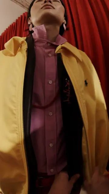 The tie of a scarf. A flip of the collar. The Polo way of styling comes together