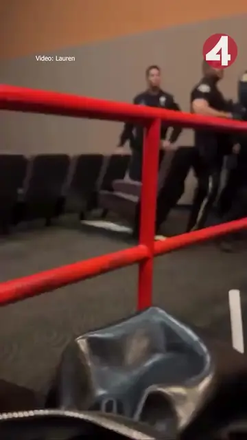 A video shows a large group of armed San Jose Police officers inside an AMC movi