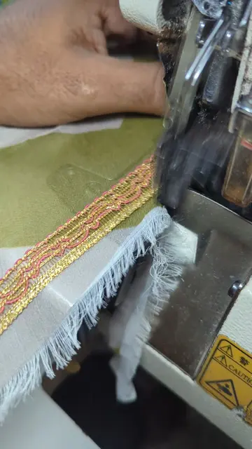 Crafting elegance with second stitch lace attachment on a dupatta, accompanied b