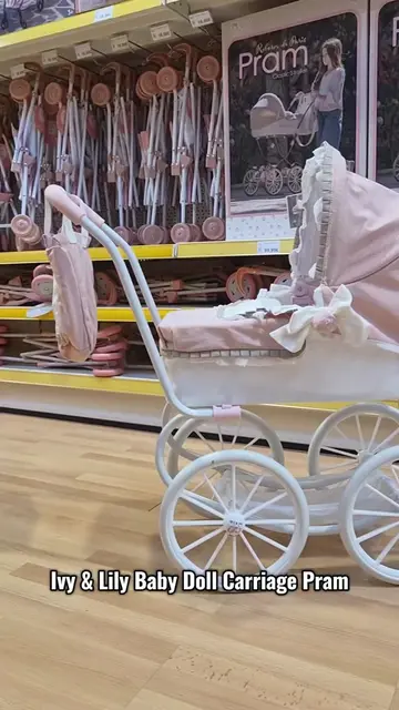 The Ivy & Lily Baby Doll Carriage Pram stands out with its pink and white carria