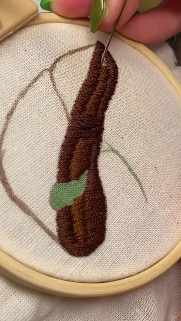 The punch needle parts of this little liver hoop 💚🤎