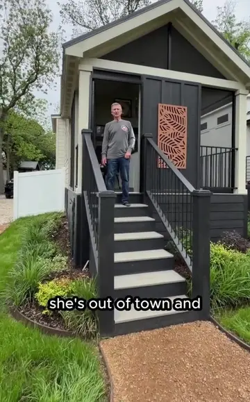 From the front door, Brian can see straight down the hall to the bedroom, loft r