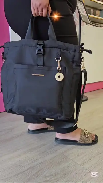 💼 Elevate your style on the move.  Watch how this premium shoulder bag perfectl