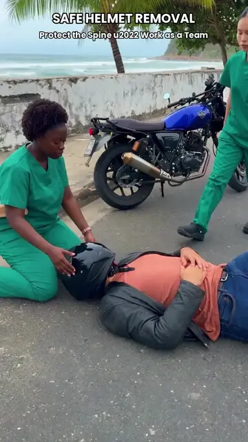 Never remove a motorcycle helmet alone. One wrong move can cause permanent spina