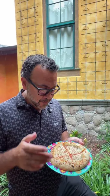 Is the Animal Kingdom pizza perfection—or a pass? #disney #pizza #disneyparks
