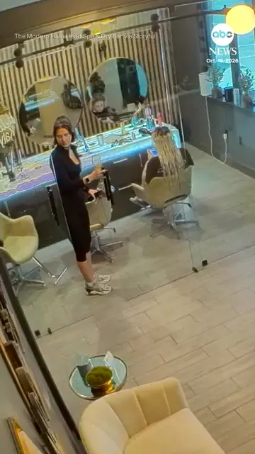 A new employee at a Texas salon is off to a smashing start after a glass sliding